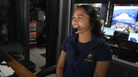 Malanai N. Kāne Kuahiwinui sits in the broadcast studio of Nautilus