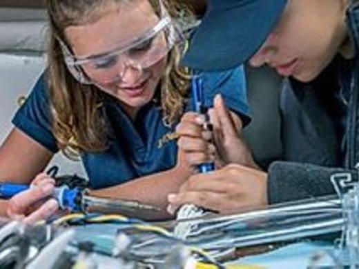 Students soldering